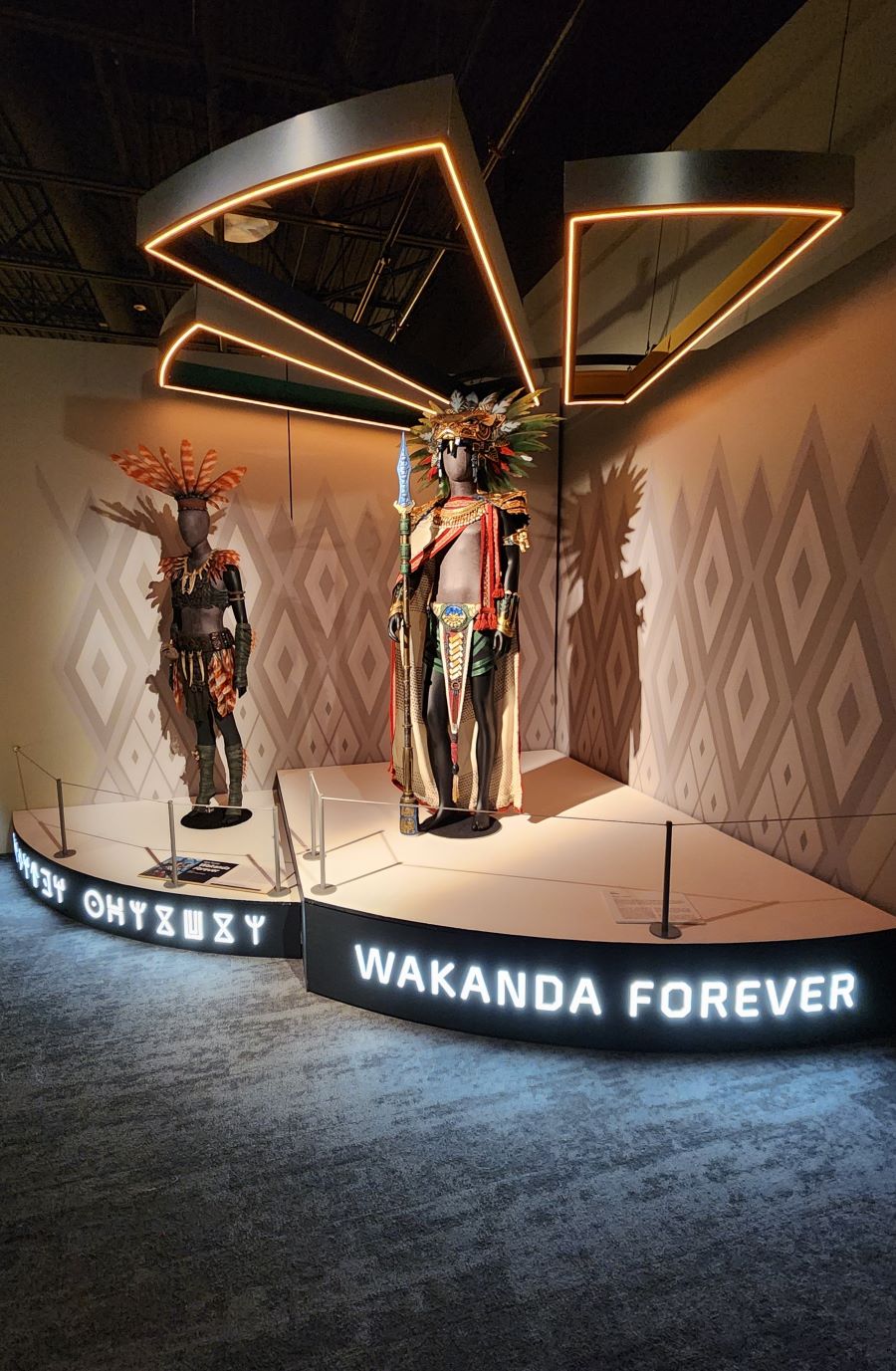 Two costumes from Black Panther: Wakanda Forever