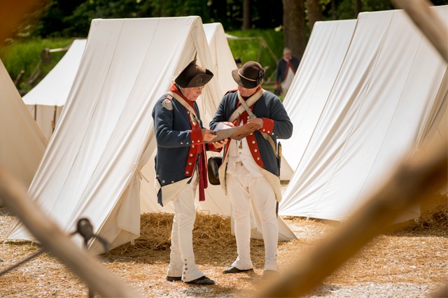 Soldiers in the Continental Army encampment at the American Revolution Museum at Yorktown.
